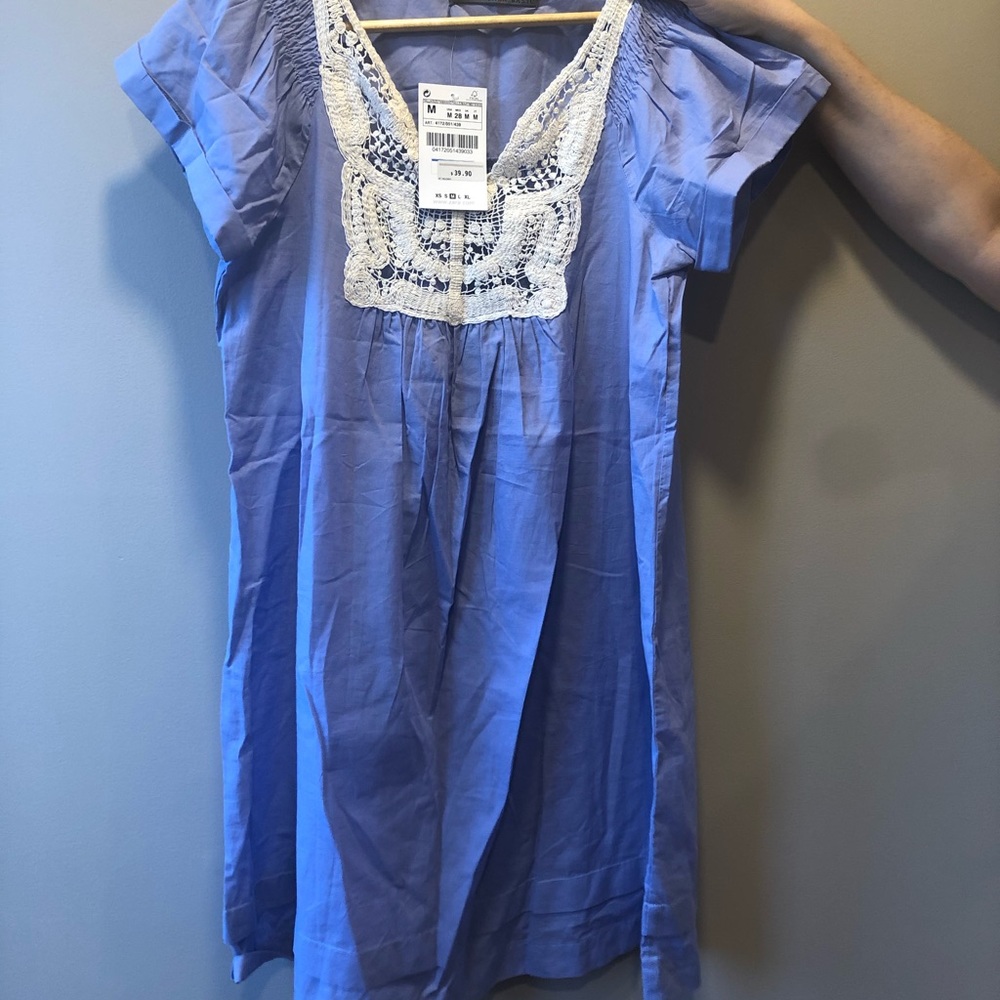 Short dress with crochet trimming brand new